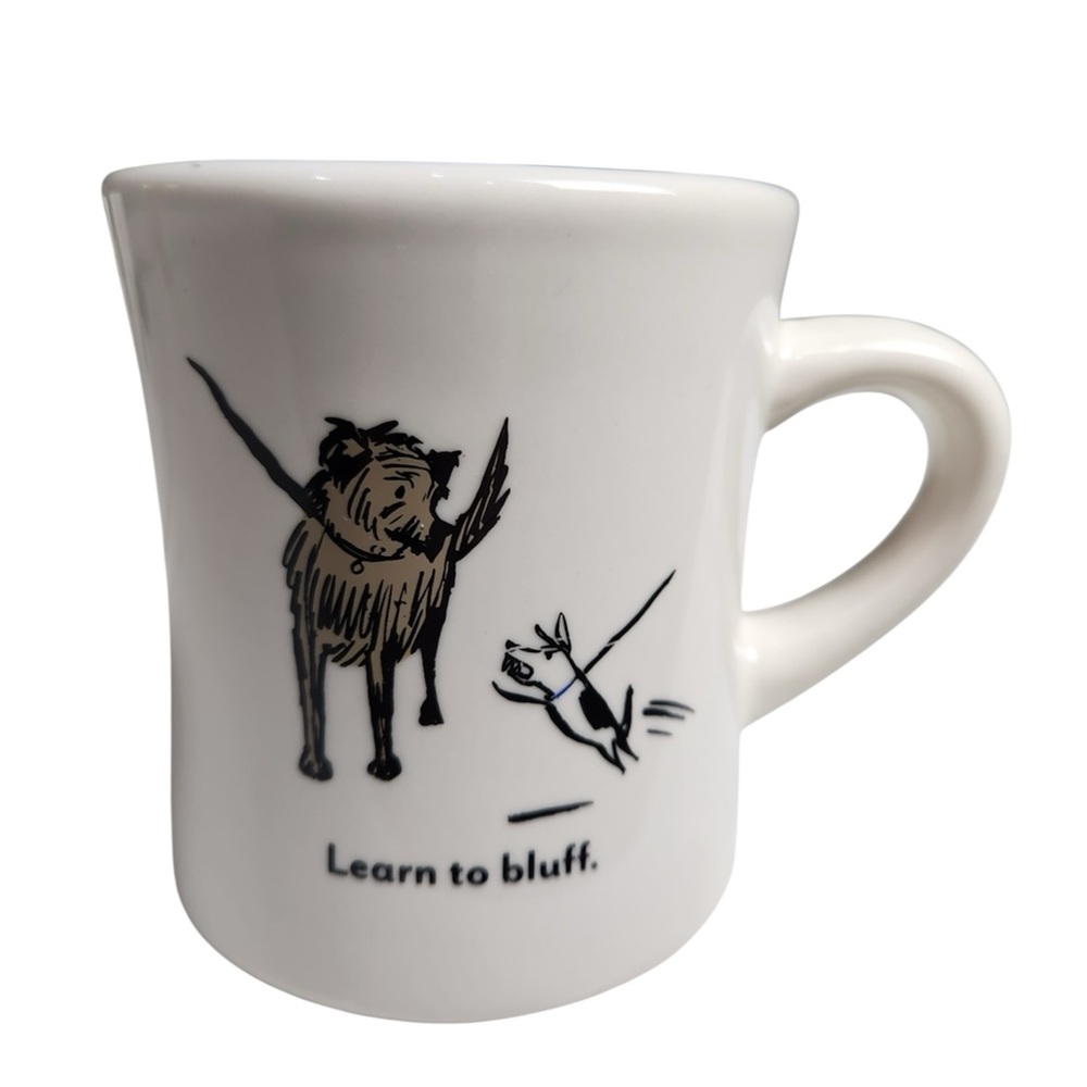 Bad Dog Wisdom" coffee mug featuring the phrase "Learn to bluff"